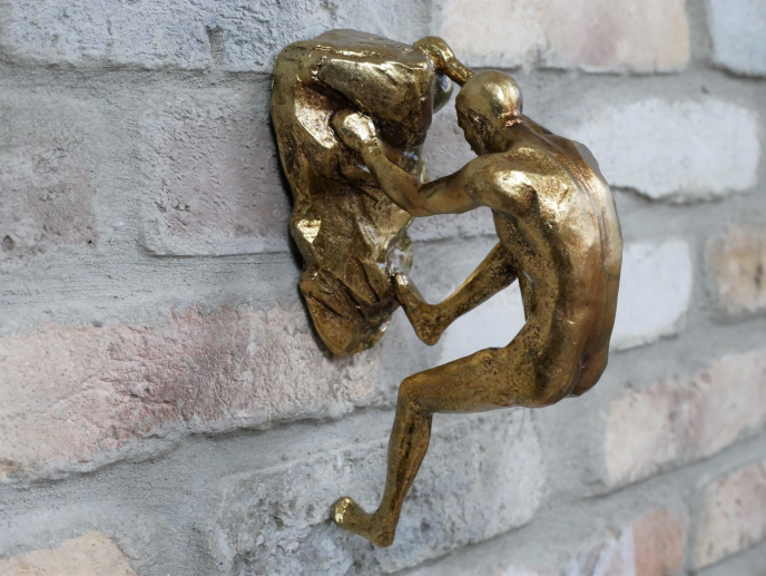 Gold Rock Climbing Man Wall Art Feature